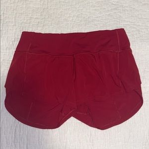 red Lululemon shorts